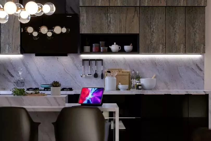 Island kitchen with rustic look stone finish1